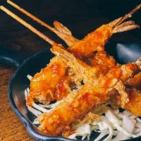 Butter Shrimp Tempura · Crispy buttermilk fried shrimp and sweet chili sauce.