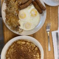 Big Breakfast · 3 eggs any style, hash browns or home fries, a pancake, 3 bacon or 3 sausage (4 links).