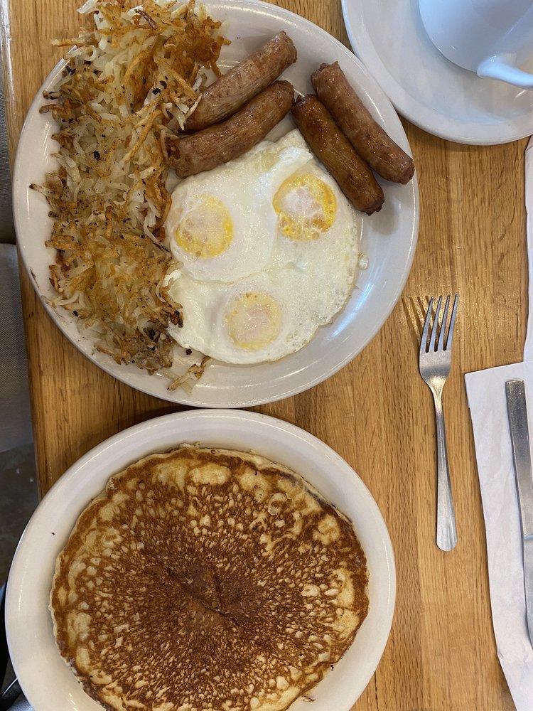 Big Breakfast · 3 eggs any style, hash browns or home fries, a pancake, 3 bacon or 3 sausage (4 links).