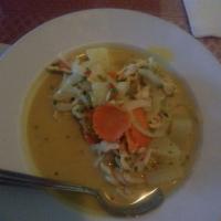 Yellow Curry · Mild yellow curry in coconut milk with potatoes, yellow onions and carrots. Includes steamed...