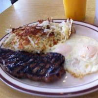 Ham Steak and Eggs · Ham steak with 2 eggs made to order, hash browns and toast.