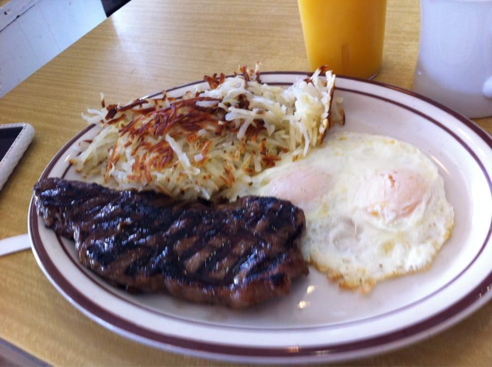 Ham Steak and Eggs · Ham steak with 2 eggs made to order, hash browns and toast.