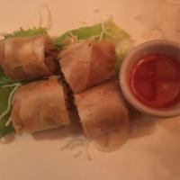 Thai Spring Roll · 3 pieces. Served with bamboo shoot, cabbage, carrot and bean thread.