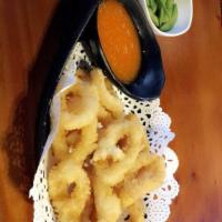 Fried Calamari · Deep fried squid ring with bread flakes.