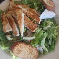 Greek Salad · Romaine, tomatoes, cucumbers, red onions, Kalamata olives, feta, red wine vinaigrette and ga...