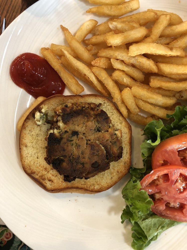 Crab Cake Sandwich · Lettuce, tomato and Cajun remoulade sauce on a bun.