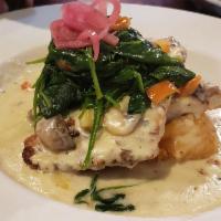 Pollo Xochitl · Pan-fried chicken breast accompanied with our signature jimador tequila cream sauce, over ch...