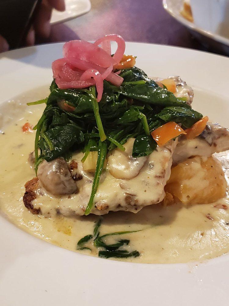 Pollo Xochitl · Pan-fried chicken breast accompanied with our signature jimador tequila cream sauce, over chipotle mashed potatoes, and spinach.