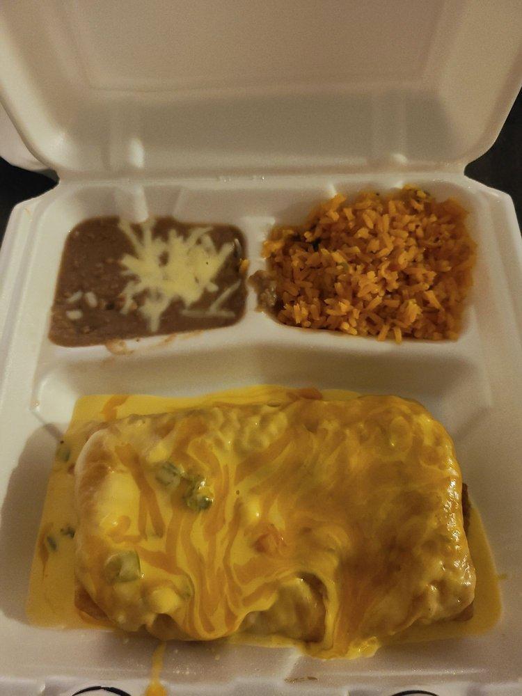Chimichanga · Large flour tortilla with your choice of chicken, beef fajita or brisket, topped with ranchero sauce or chile con queso served with rice, beans, and guacamole.