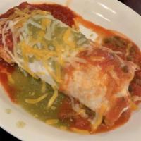 Tres Salsas Burrito · Large flour tortilla stuffed with rice, beans, lettuce, tomatoes, cheese, sour cream and you...