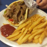The Gyro Picado · Seasoned meat served with sautéed onions, peppers and jalapenos. Includes fries or salad.