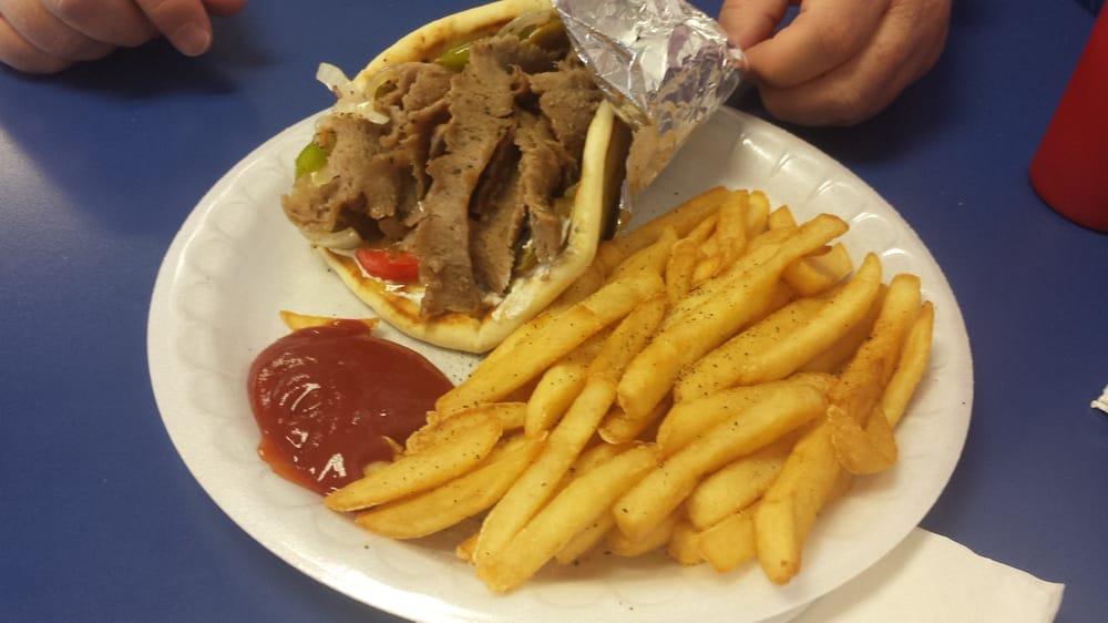 The Gyro Picado · Seasoned meat served with sautéed onions, peppers and jalapenos. Includes fries or salad.