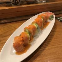 Marilyn Monroe Roll · Salmon, avocado, masago on top of spicy tuna roll, served with Midori sauce. Raw. Spicy.