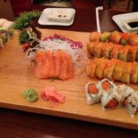 Phoenix Roll · Deep-fried roll with chopped salmon, red snapper, and tuna, masago on top, served with Midor...