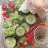 Garden Salad · A mix of iceberg and romaine lettuce, cucumber, tomatoes, green peppers, red onions, Kalamat...