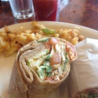 Breakfast Wrap · 3 scrambled eggs with bacon, ham or sausage and American cheese. Served with home fries.
