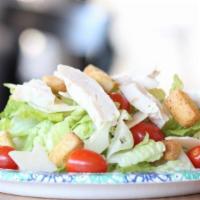 Caesar Salad · Romaine lettuce, grape tomatoes and shaved Parmesan cheese.