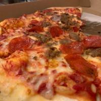 Bruin Pizza · Pepperoni, sweet italian sausage, bacon, meatballs,& mozzarella