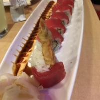 Colleyville Roll · Tempura shrimp inside with tuna on top and served with special sauce. Spicy.