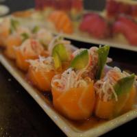 Butterfly Kiss Roll · Salmon sashimi wrapped around crabmeat and avocado served with ponzu sauce. (No rice, no sea...