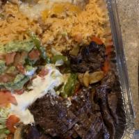 Carne Asada · Skirt steak charbroiled the Mazatlan way. Served with guacamole and pico de gallo. Gluten fr...