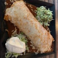 Carne Asada Burrito · A flour tortilla filled with charbroiled skirt steak, beans and rice. Topped with lettuce, p...
