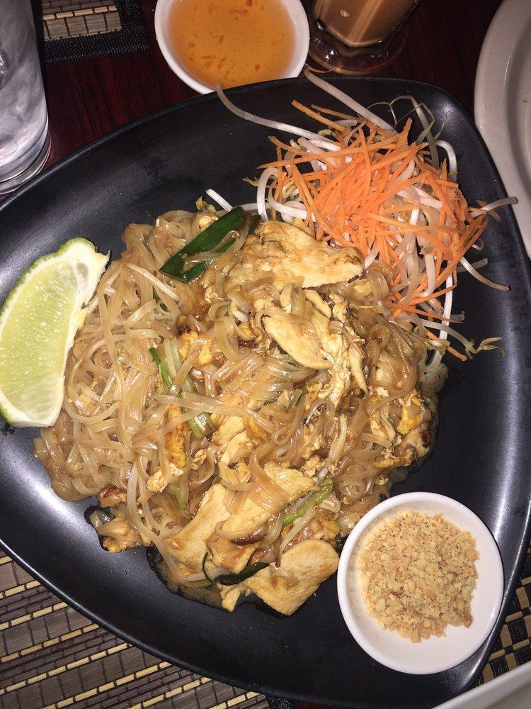 Pad Thai · Rice noodles, bean sprouts, green onions, and egg accompanied with crushed peanuts and lime.