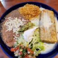 Chimichanga · Deep fried flour tortilla stuffed with chicken, ground or shredded beef covered with cheese ...