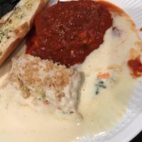 Meat Lasagna · Includes garlic bread.