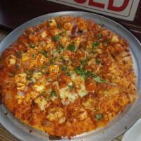 Paneer Tikka Masala Pizza · Chef's special tomato cream sauce, marinated paneer, red onion, fresh cilantro, fresh garlic...