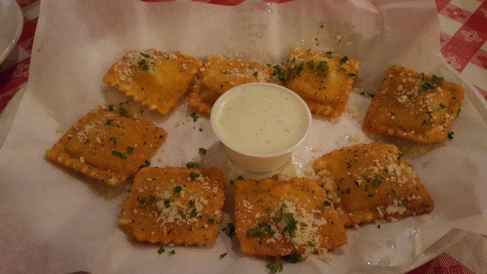 Fried Ravioli · Ravioli filled with a blend of spicy cheeses lightly breaded and deep-fried. Served with our famous jalapeno ranch.