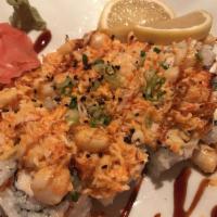 Baked Scallop Roll · Special baked scallop on the California roll.