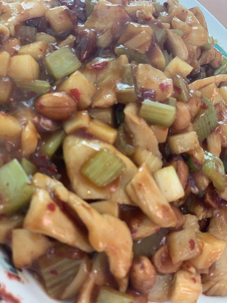 Kung Pao Chicken · Chicken stir-fried with peanuts, bamboo shoots, celery, green onion and red chili peppers in a spicy chili sauce. Hot and spicy.