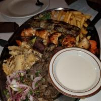Shish Combo · 1 skewer kabob, 1 skewer tawook and 1 skewer kafta. Served with rice or fries and soup or sa...