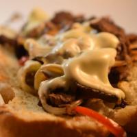 Philly Cheese Steak · Steak, peppers, mushroom, onion and white American cheese.