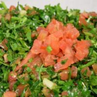 Tabbouleh Salad · Flat leaf parsley, diced tomatoes, scallions and fresh mint leaves with crushed wheat and le...