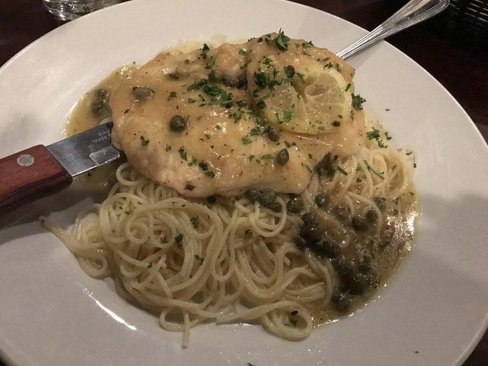 Chicken Piccata · Thin tender cutlet in lemon butter wine sauce with capers over angel hair pasta.