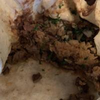 Asada Burrito · Come with rice,beans, cilantro, onions and salsa(red hot,red medium or green mild)