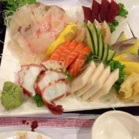 Sashimi · Fluke, salmon, tuna, white tuna- 4 pieces each.