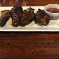 Jerk Wings · LARGE SIZE ONLY. (9 COUNT) Marinated in a combination of Jamaican spices and sauce then gril...