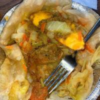 Vegetable Roti · This meal is served with one roti skin filled with shredded cabbage, shredded carrots and sl...