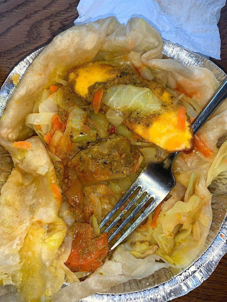 Vegetable Roti · This meal is served with one roti skin filled with shredded cabbage, shredded carrots and slices of sweet peppers.