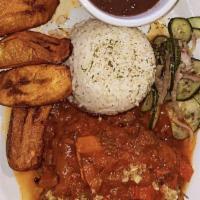 Ropa Vieja · Shredded beef, green and red peppers, onions, green olives, served with white rice, black be...