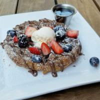 Churro Waffle · Cinnamon sugar, vanilla ice cream, nutella and fresh berries.