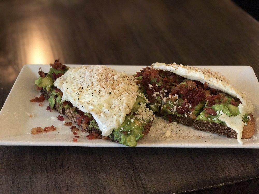 Avocado Toast · 2 eggs any style, sourdough bread, avocado relish and Cotija cheese. Add bacon, organic chicken sausage or sausage salmon for and additional charge.