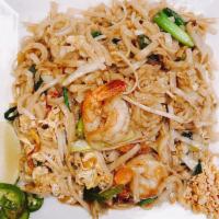 Pad Thai · Thin rice noodle stir-fried with eggs, bean sprouts, onions, with side of peanuts, jalapeno ...