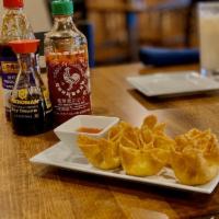 5 Crab Rangoon · Crab meat mixed with cream cheese, wrapped in wonton, deep fried served with a sweet and tan...