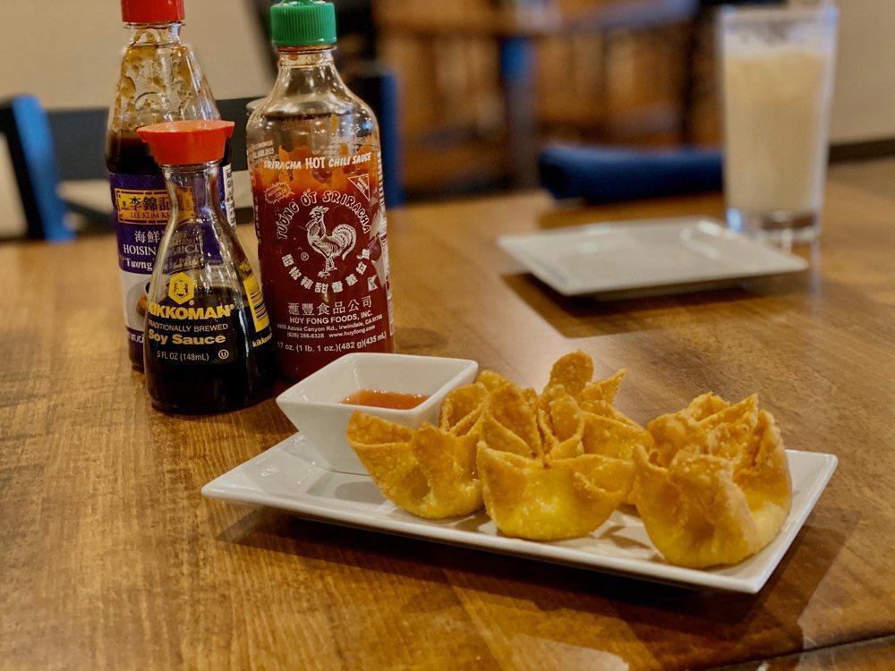 5 Crab Rangoon · Crab meat mixed with cream cheese, wrapped in wonton, deep fried served with a sweet and tangy sauce.