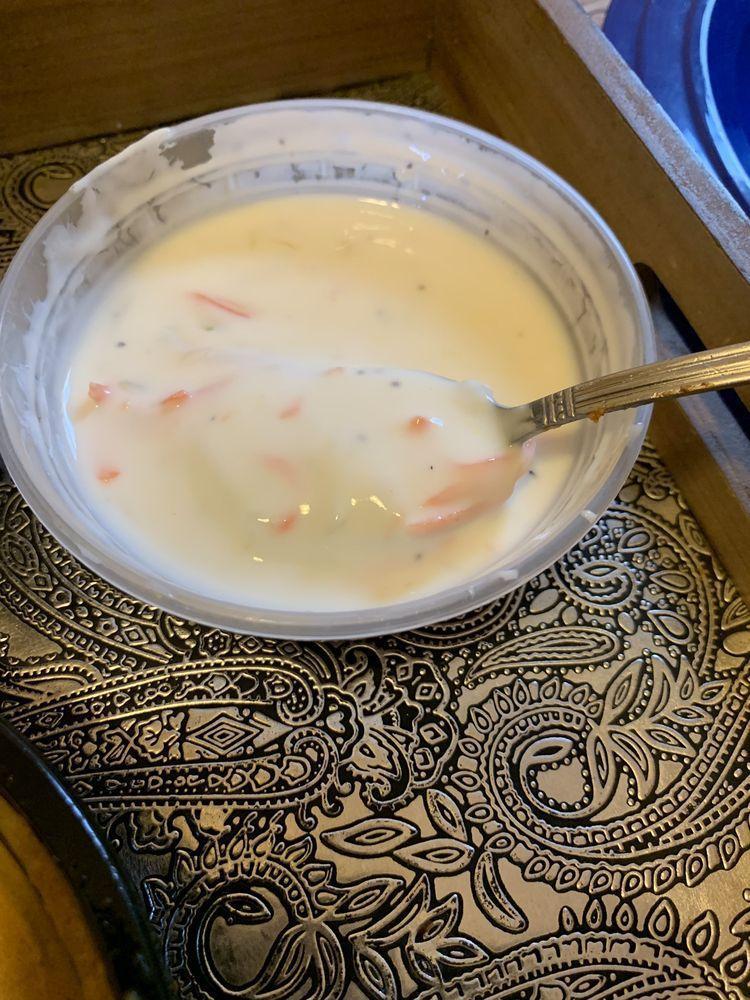 Raita · Homemade yogurt with cucumber, carrot, potatoes and mint.