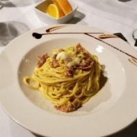 Spaghetti Alla Carbonara Signature Dish · 